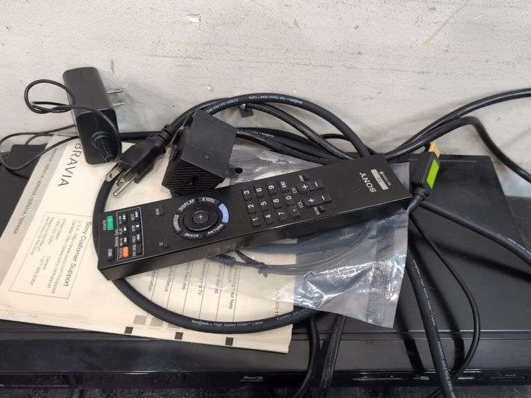 Variety of electronics, including Blu-ray player. 2d