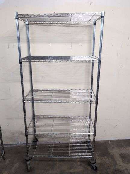 Metal shelving unit on wheels 35.5" x 18" x 77" tall