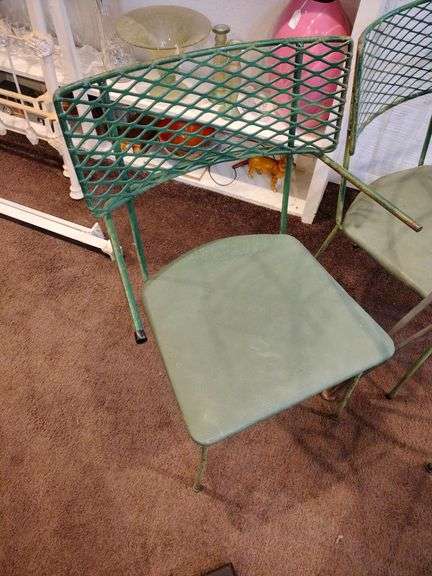 Round metal table with 4 chairs