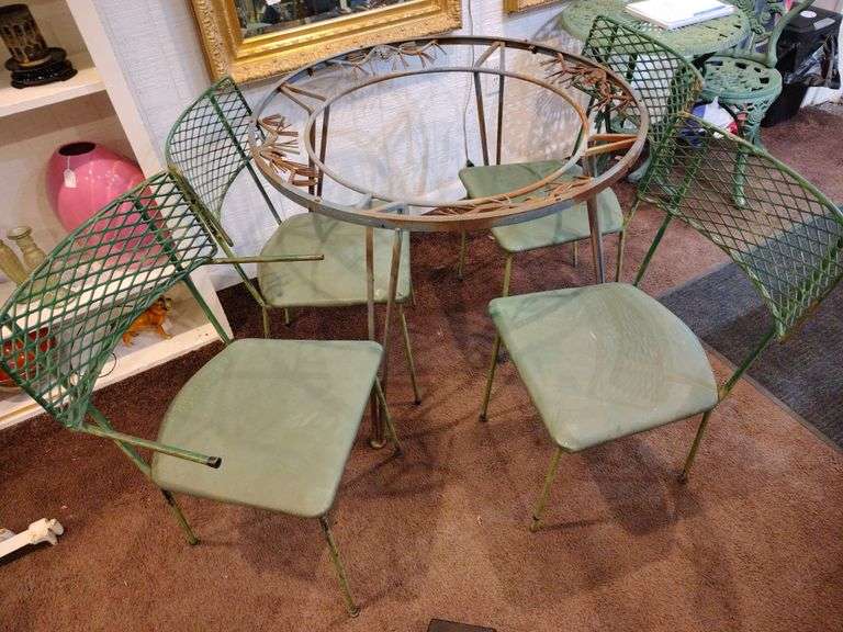 Round metal table with 4 chairs