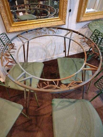 Round metal table with 4 chairs