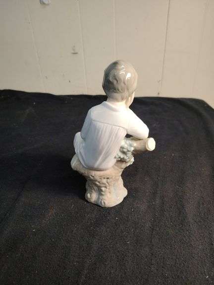 Lladro child in chair figurine