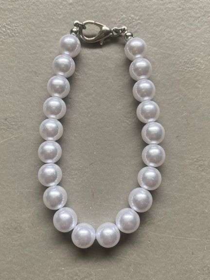 Pearl bracelet &3 pr  earrings