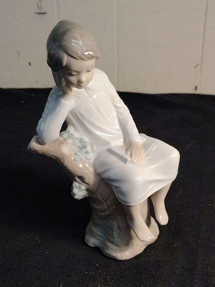 Lladro child in chair figurine