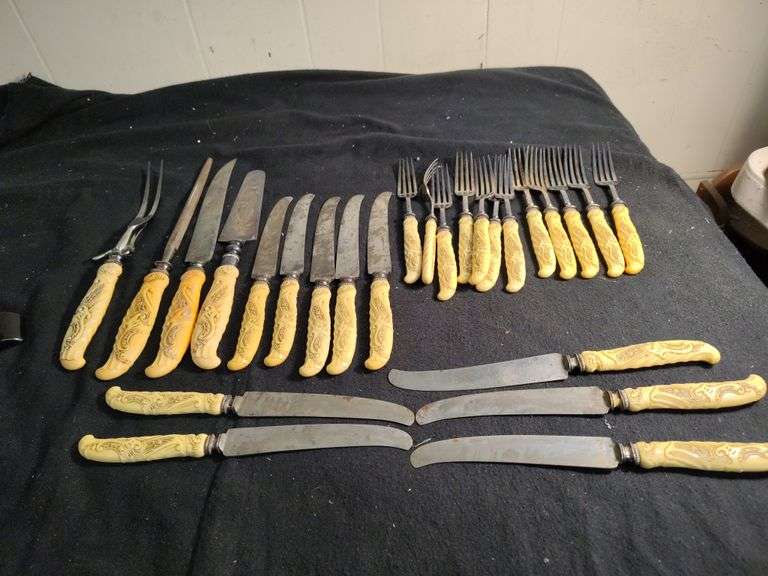 1930 Frary & Clark yellow cellidoid handles knives, forks & serving set 26 pieces