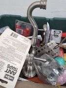 Large tote of miscellaneous household items. 2e