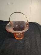 Pink depression glass basket