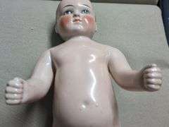 "Frozen Charlie" china bathing doll 16.5"