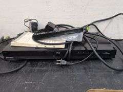 Variety of electronics, including Blu-ray player. 2d