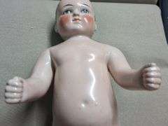 "Frozen Charlie" china bathing doll 16.5"