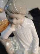 Lladro child in chair figurine