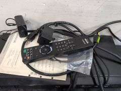 Variety of electronics, including Blu-ray player. 2d