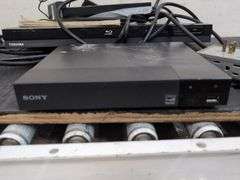Variety of electronics, including Blu-ray player. 2d