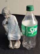 Lladro child in chair figurine