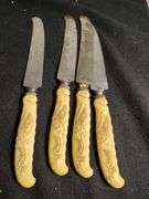 1930 Frary & Clark yellow cellidoid handles knives, forks & serving set 26 pieces