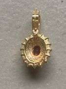 2 red stone pendants