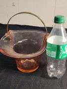 Pink depression glass basket