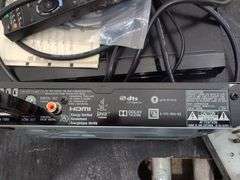 Variety of electronics, including Blu-ray player. 2d