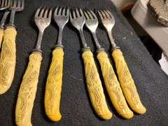 1930 Frary & Clark yellow cellidoid handles knives, forks & serving set 26 pieces