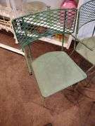 Round metal table with 4 chairs