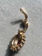 2 red stone pendants