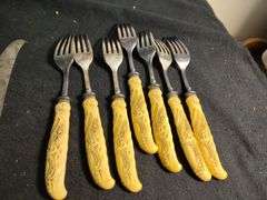 1930 Frary & Clark yellow cellidoid handles knives, forks & serving set 26 pieces