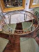 Round metal table with 4 chairs