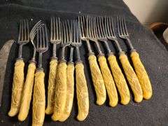 1930 Frary & Clark yellow cellidoid handles knives, forks & serving set 26 pieces