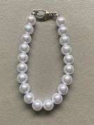 Pearl bracelet &3 pr  earrings