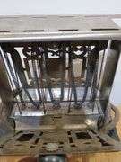 Vintage toaster and candy thermometer. 7d