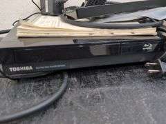 Variety of electronics, including Blu-ray player. 2d