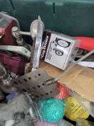 Large tote of miscellaneous household items. 2e