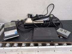 Variety of electronics, including Blu-ray player. 2d