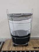 Rolling Laundry Basket. 20C