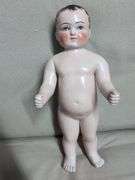 "Frozen Charlie" china bathing doll 16.5"