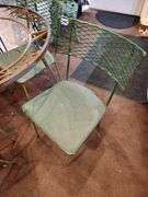 Round metal table with 4 chairs