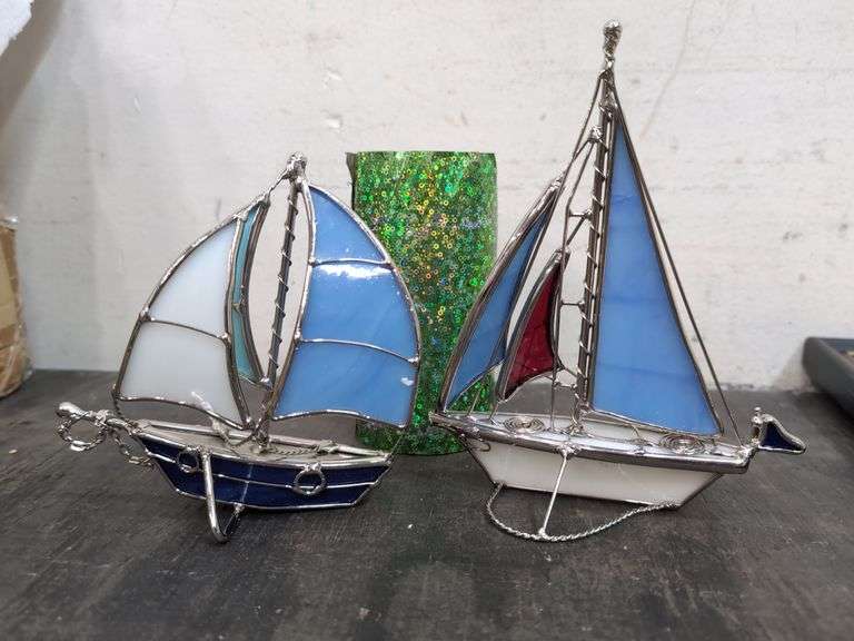 Pair of metal and glass sailboat figures. 2d