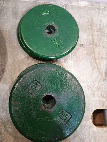 Six 5 lb barbell weights. 11c