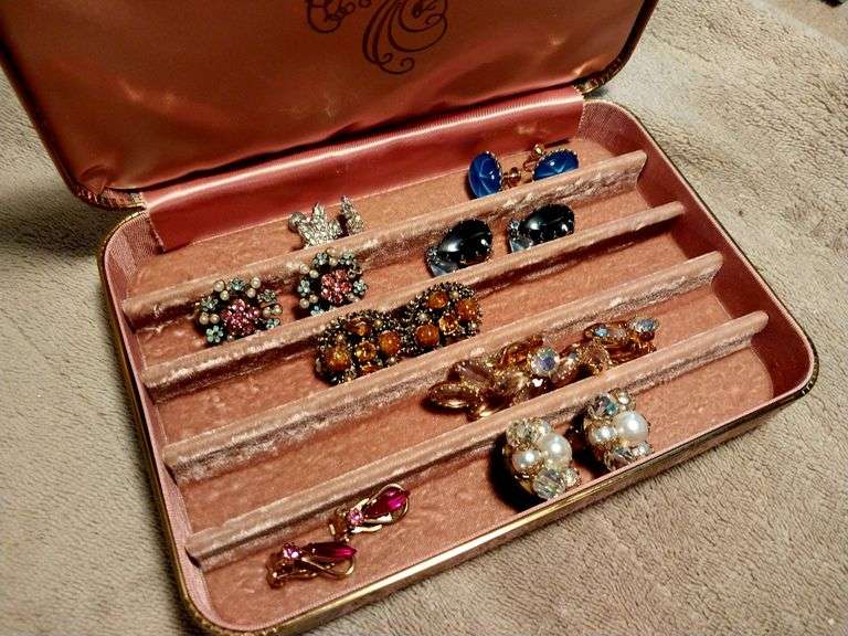 Vintage earrings in a vintage jewelry box.