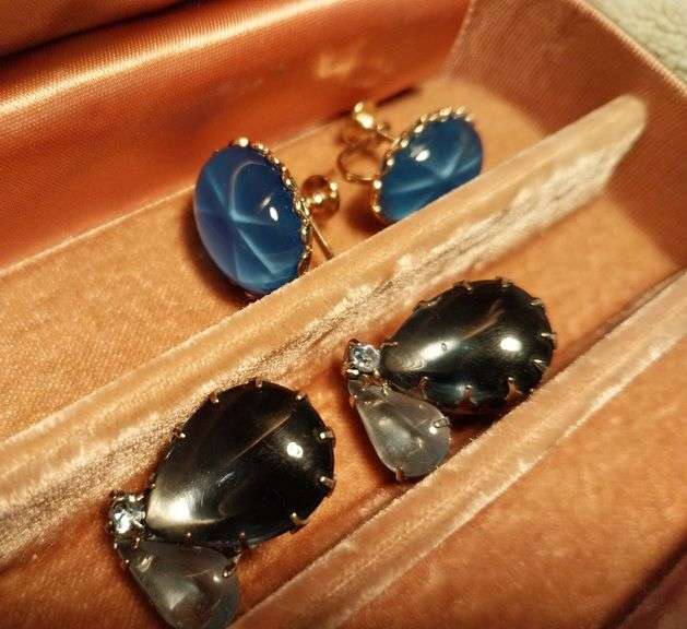 Vintage earrings in a vintage jewelry box.