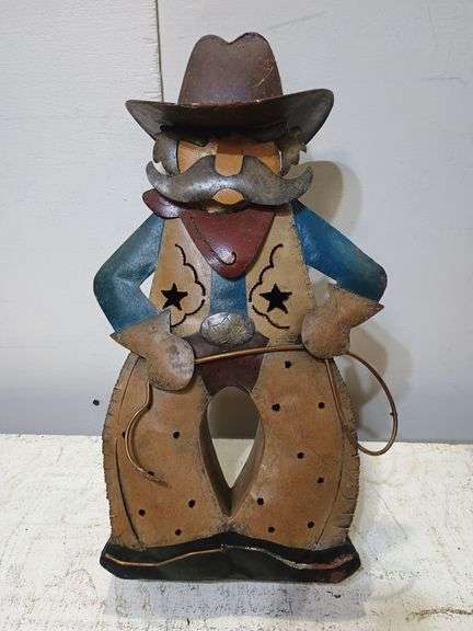 Metal cowboy candleholder. 8a