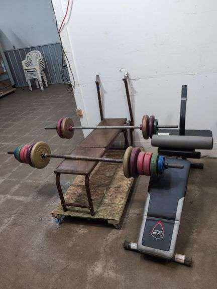 2 weight benches with weights and bars