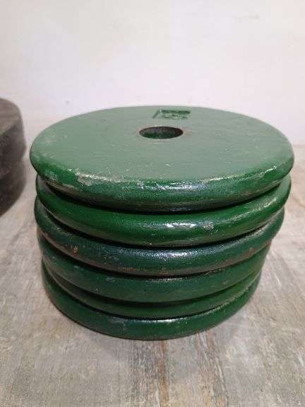 Six 5 lb barbell weights. 11c