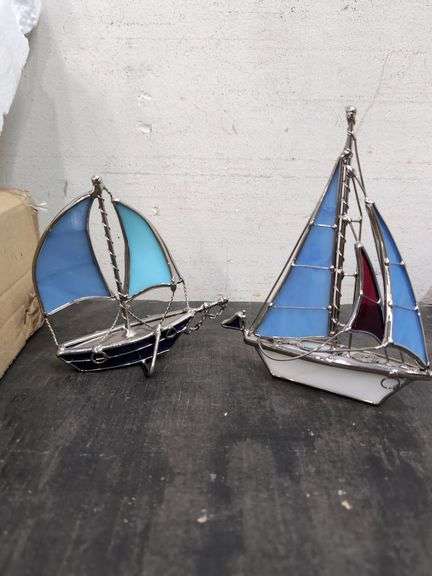 Pair of metal and glass sailboat figures. 2d