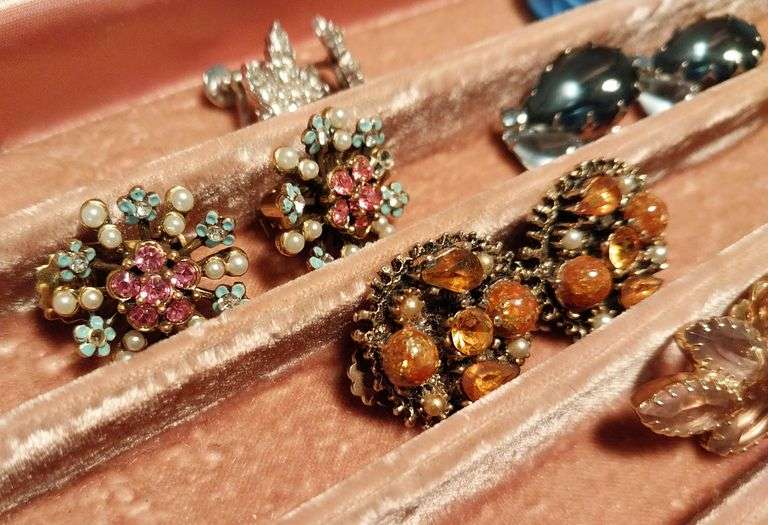 Vintage earrings in a vintage jewelry box.