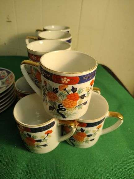 Oriental set of dishes 12 cups 12 saucers