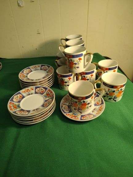 Oriental set of dishes 12 cups 12 saucers