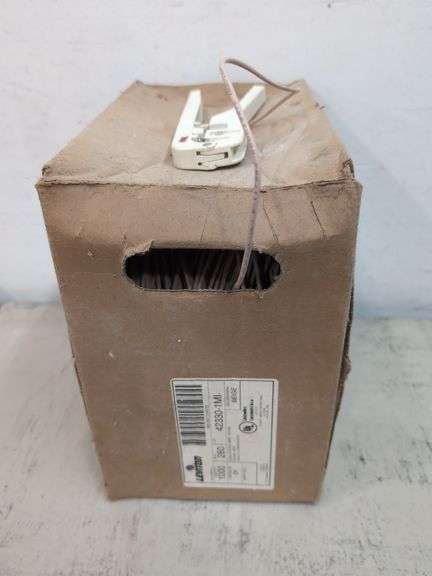 Leviton quad station wire, beige, wire stripper. 3a