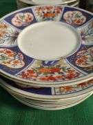 Oriental set of dishes 12 cups 12 saucers