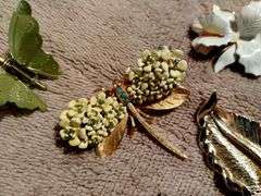 Vintage jewelry. Pins, brooches, earings.